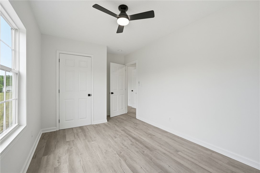 112 Sir Francis Drake Way Liberty, SC 29657 - Photo 26 of 42 This bright room features light-toned flooring and a window offering views of the outdoors.