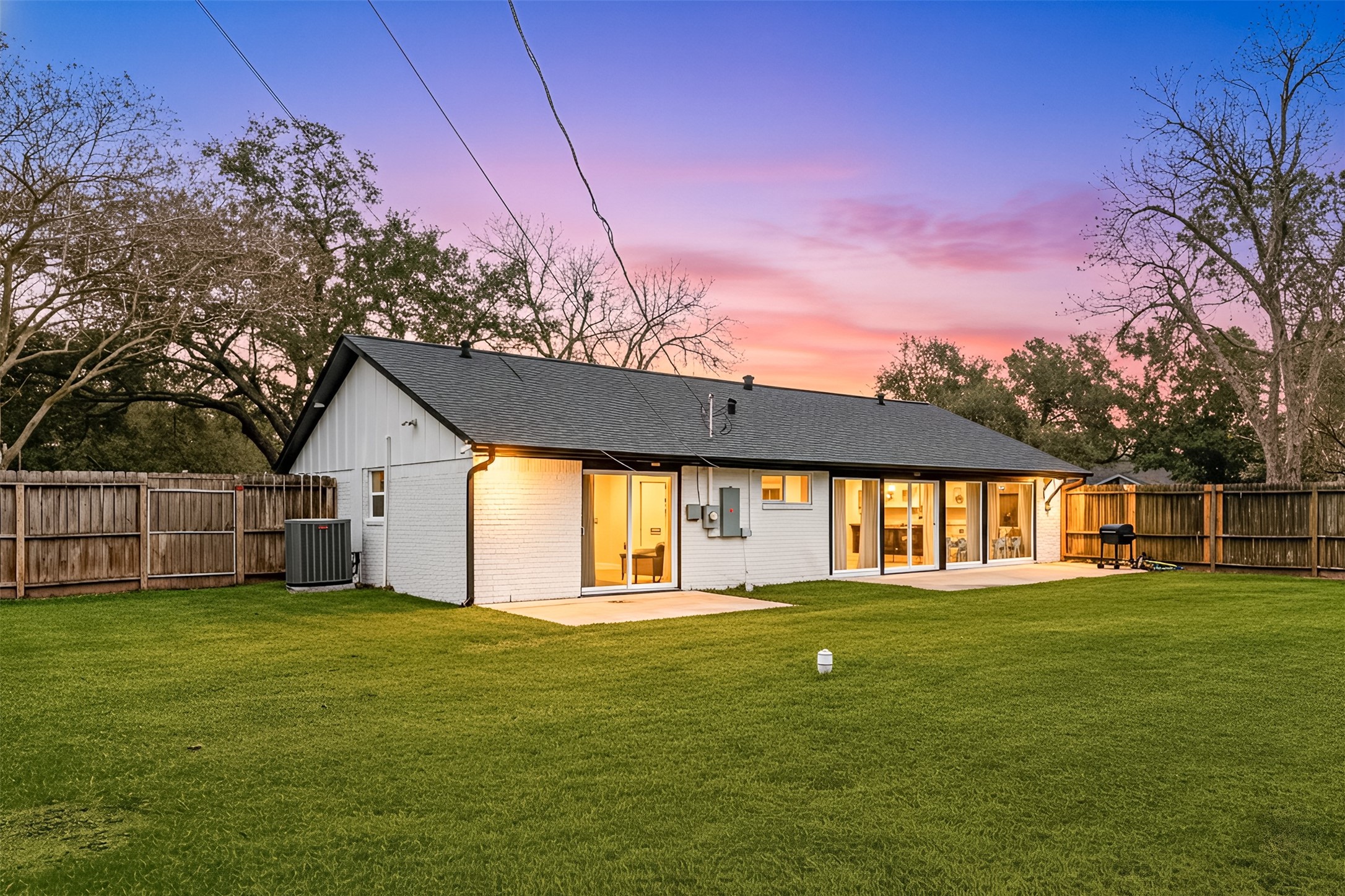 3410 Tanglewilde Street Houston, TX 77063 - Photo 2 of 17 a house view with garden space