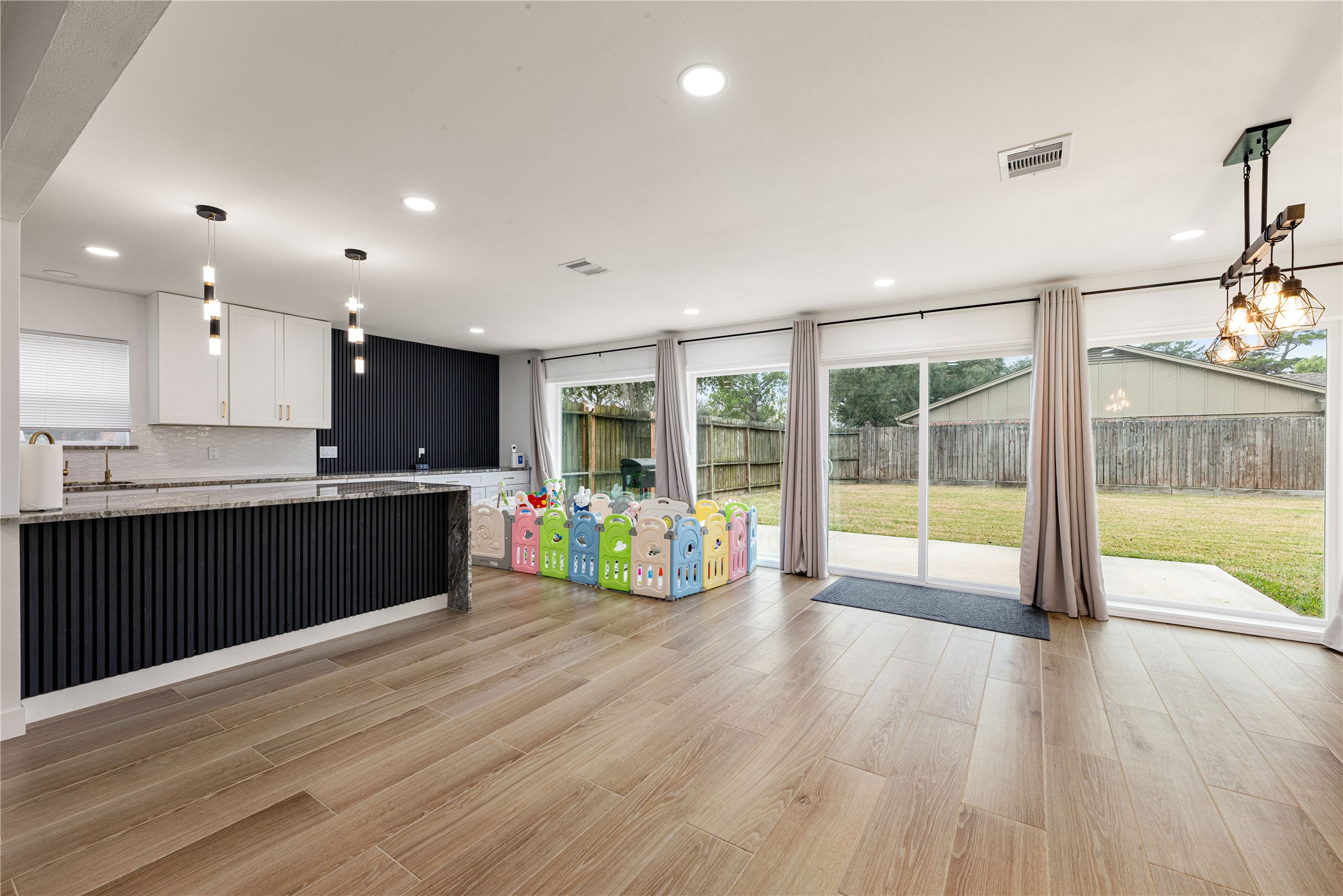 3410 Tanglewilde Street Houston, TX 77063 - Photo 5 of 17 a large kitchen with lots of counter space and appliances