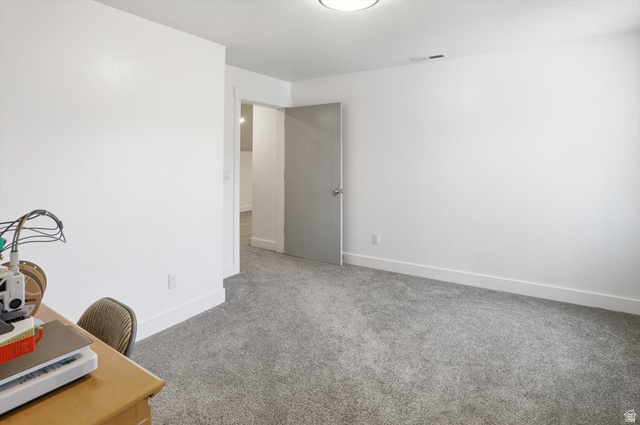 1009 High Creek Road Cove, UT 84320 - Photo 47 of 79 Office area or guest bedroom or playroom with light carpet and baseboards