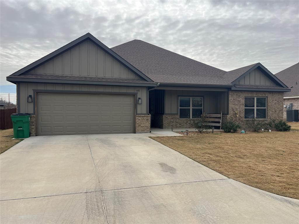 108 Wiley Stephenville, TX 76401 - Photo 1 of 25 a front view of the house with yard