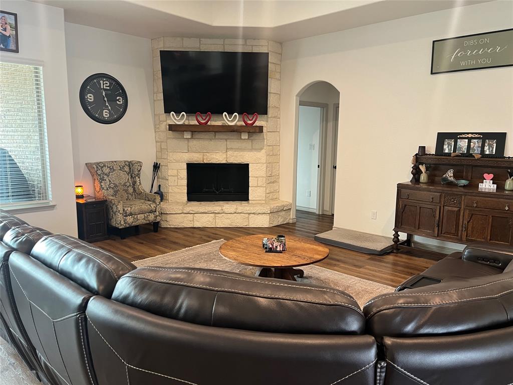 108 Wiley Stephenville, TX 76401 - Photo 18 of 25 a living room with furniture and a flat screen tv