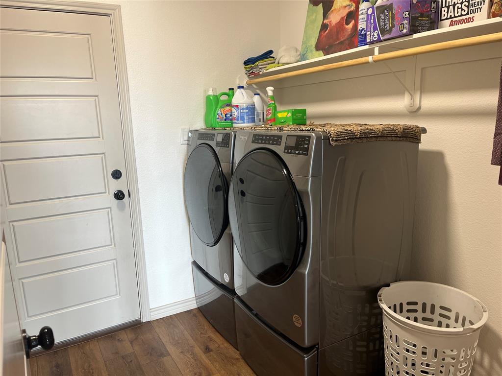 108 Wiley Stephenville, TX 76401 - Photo 22 of 25 a utility room with dryer and washer