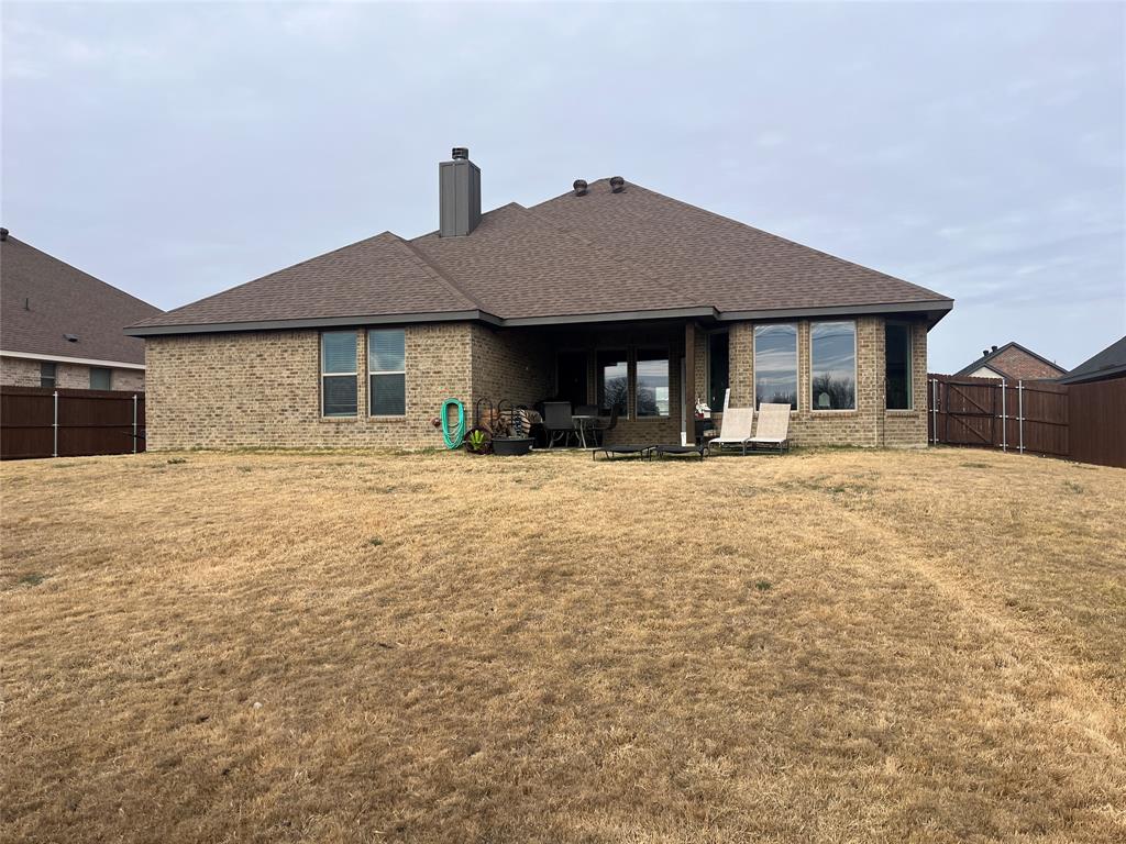 108 Wiley Stephenville, TX 76401 - Photo 24 of 25 a front view of a house with a yard