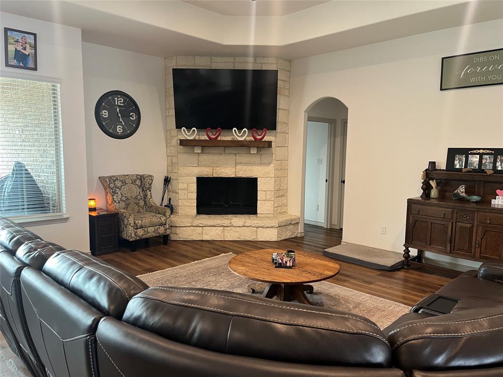 108 Wiley Stephenville, TX 76401 - Photo 3 of 25 a living room with furniture and a flat screen tv