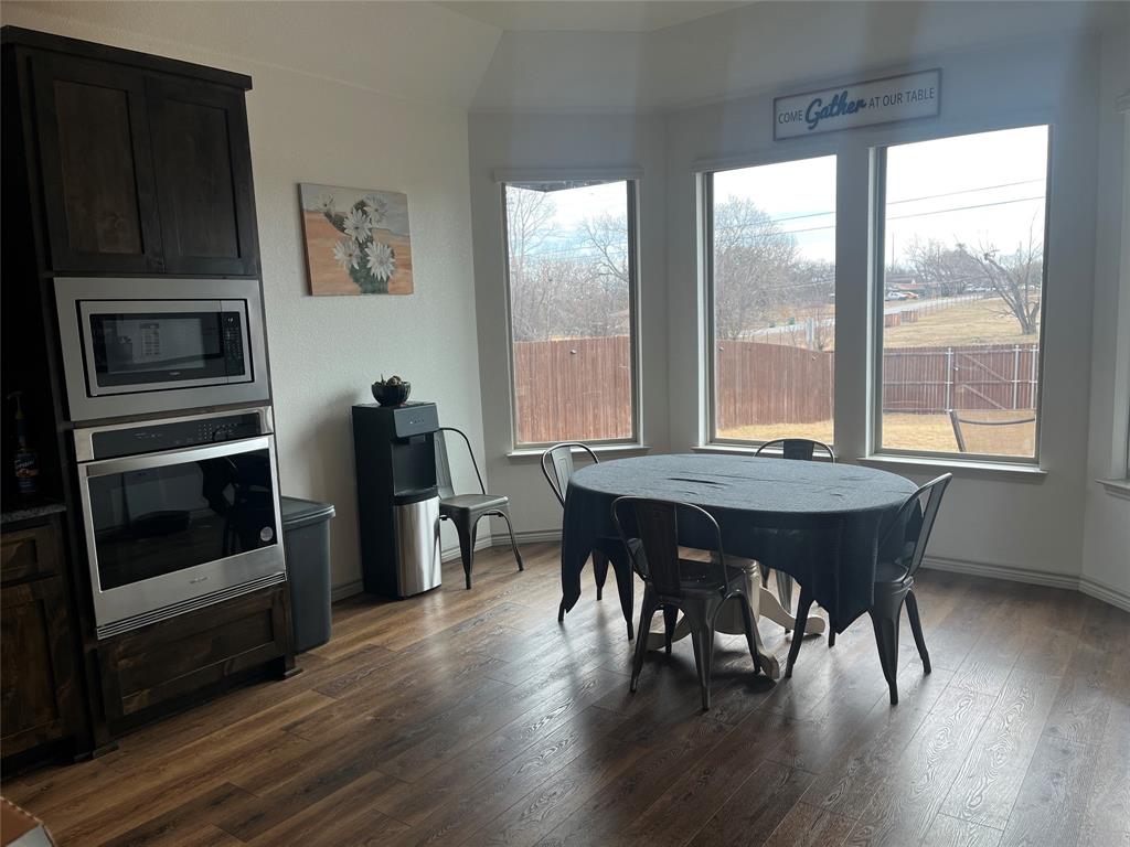 108 Wiley Stephenville, TX 76401 - Photo 5 of 25 a view of a dining room with furniture window and wooden floor