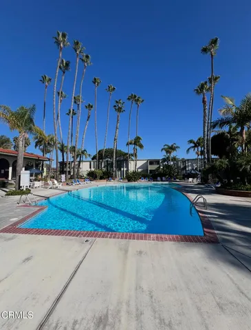 a house view with a sitting space and garden view