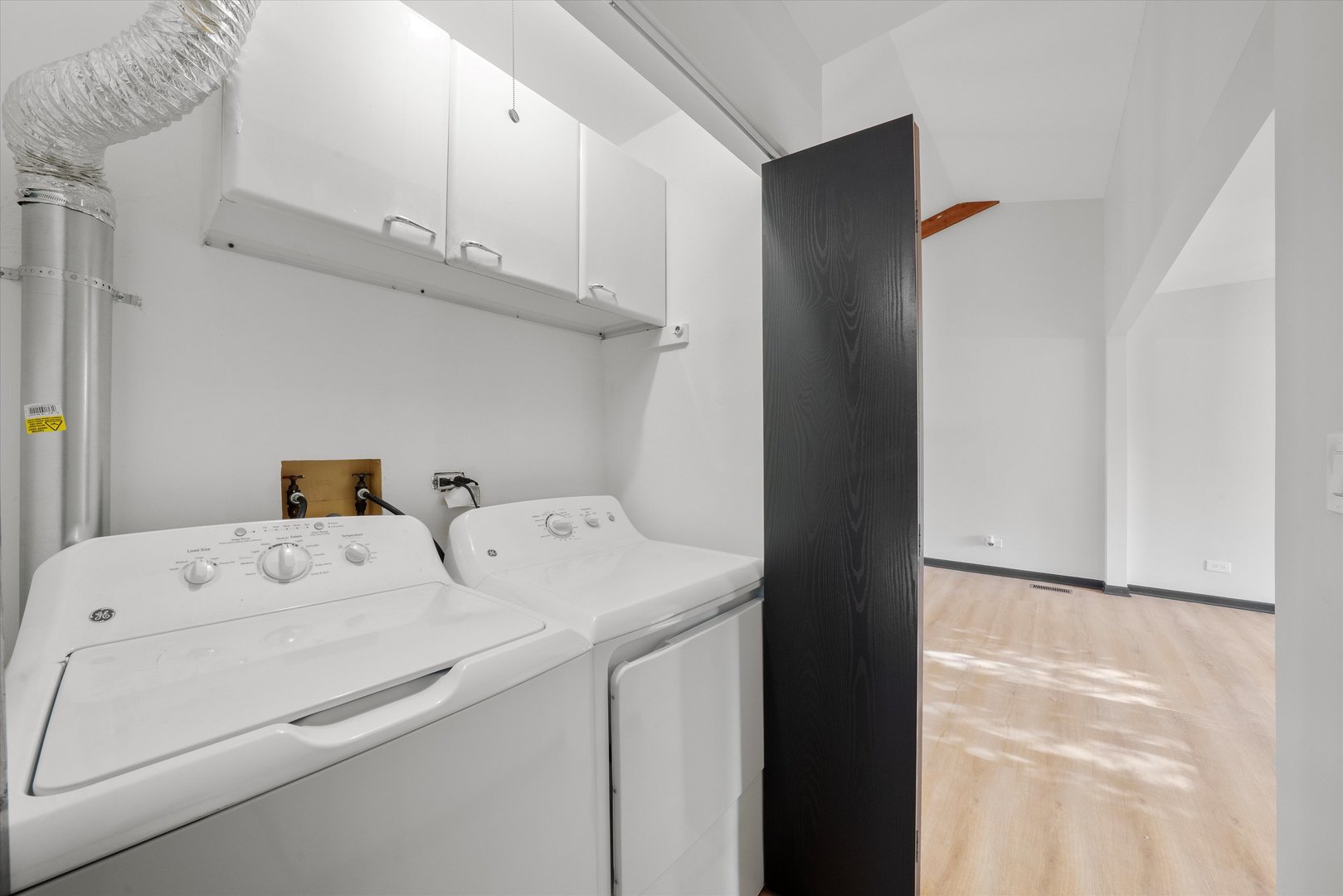 8040 Geneva Street Woodridge, IL 60517 - Photo 25 of 32 a utility room with dryer and washer