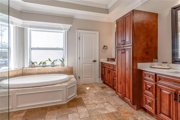 a bathroom with a sink a toilet and bathtub