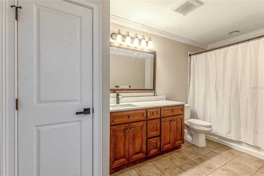 34175 Steeple Chase Way Callahan, FL 32011 - Photo 38 of 66 a bathroom with a sink a toilet and shower
