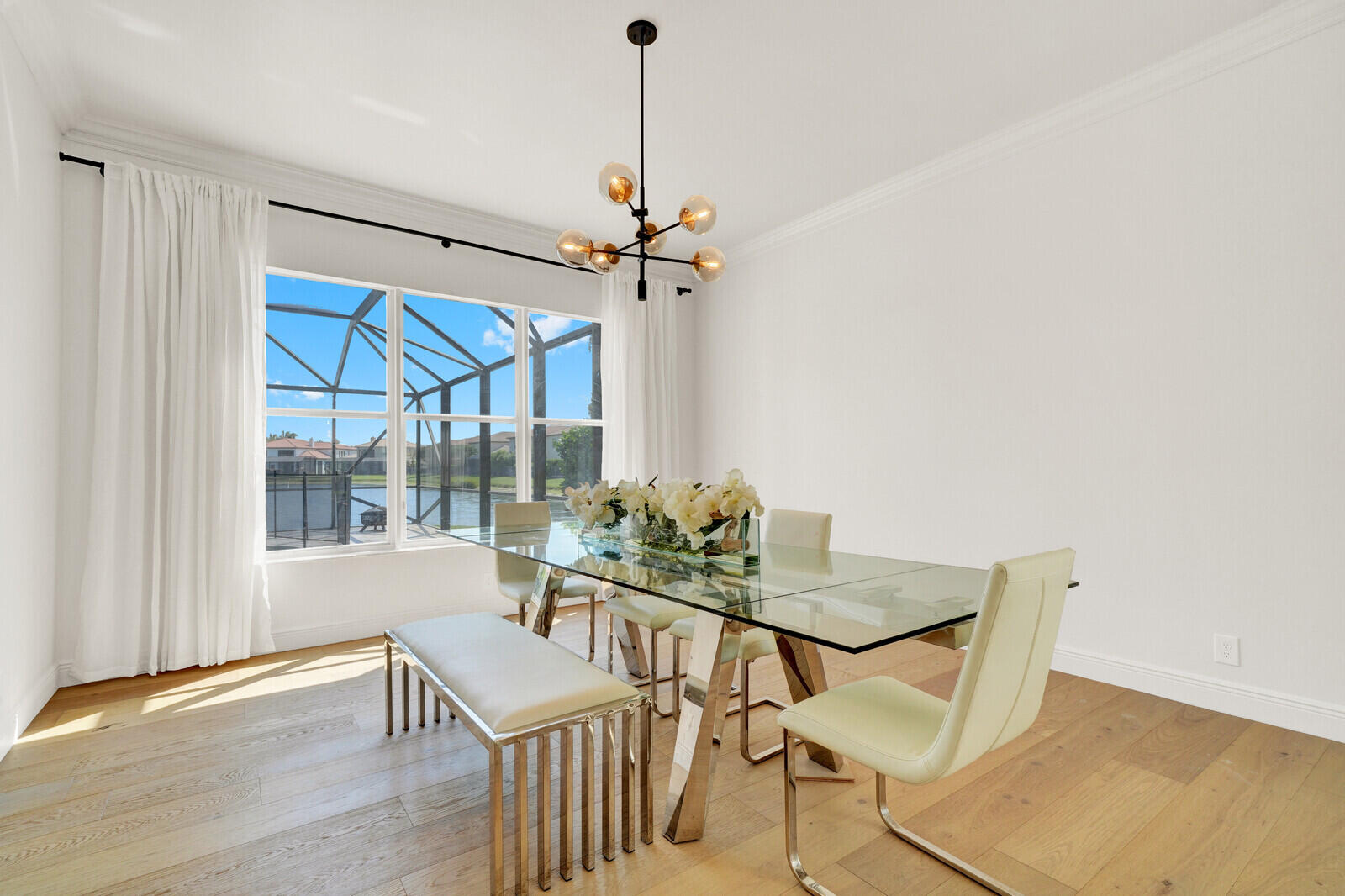 8685 Cobblestone Point Circle Boynton Beach, FL 33472 - Photo 13 of 70 a view of a dining room with furniture window and outside view