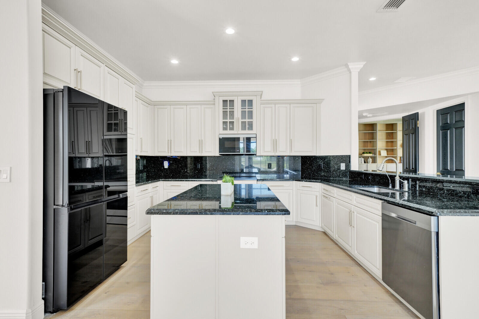 8685 Cobblestone Point Circle Boynton Beach, FL 33472 - Photo 18 of 70 a kitchen with granite countertop a sink and stainless steel appliances