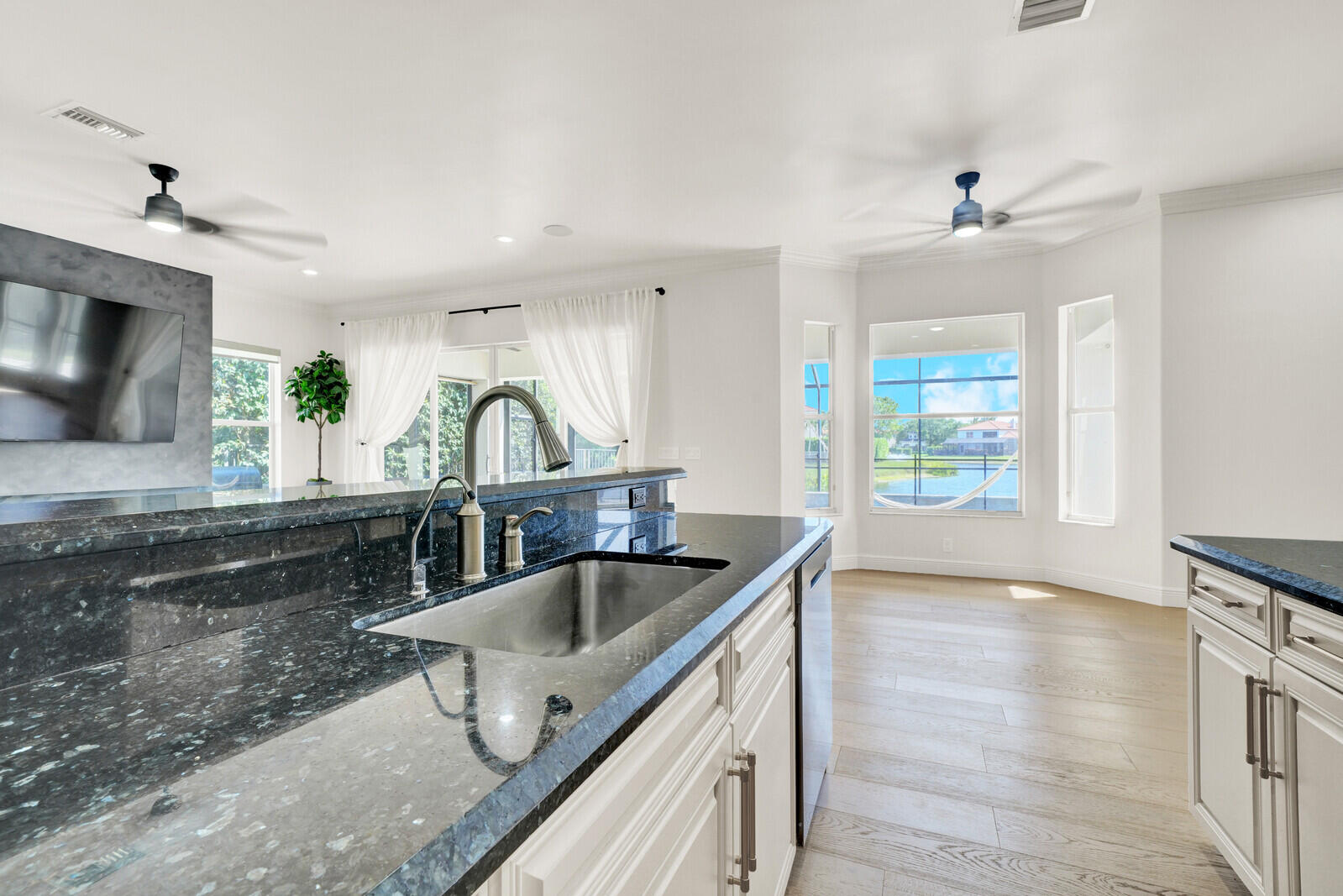 8685 Cobblestone Point Circle Boynton Beach, FL 33472 - Photo 22 of 70 a kitchen with a sink and a stove top oven