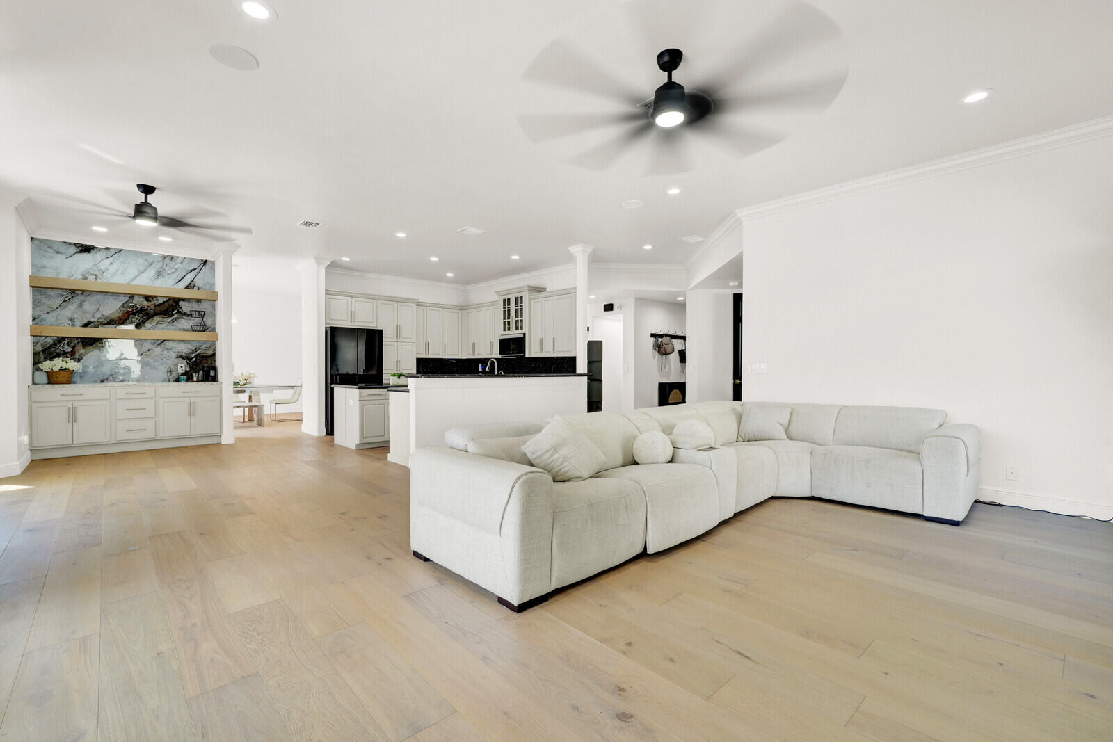 8685 Cobblestone Point Circle Boynton Beach, FL 33472 - Photo 23 of 70 a living room with furniture and a chandelier