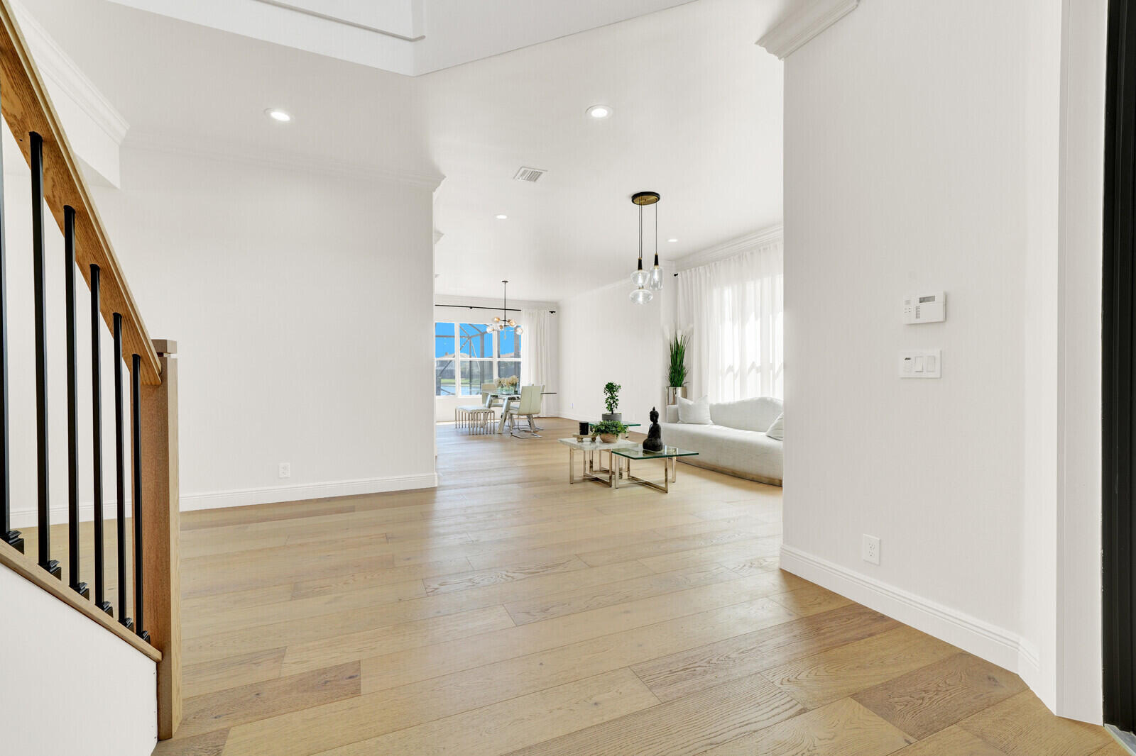 8685 Cobblestone Point Circle Boynton Beach, FL 33472 - Photo 31 of 70 an empty room with wooden floor and a ceiling fan