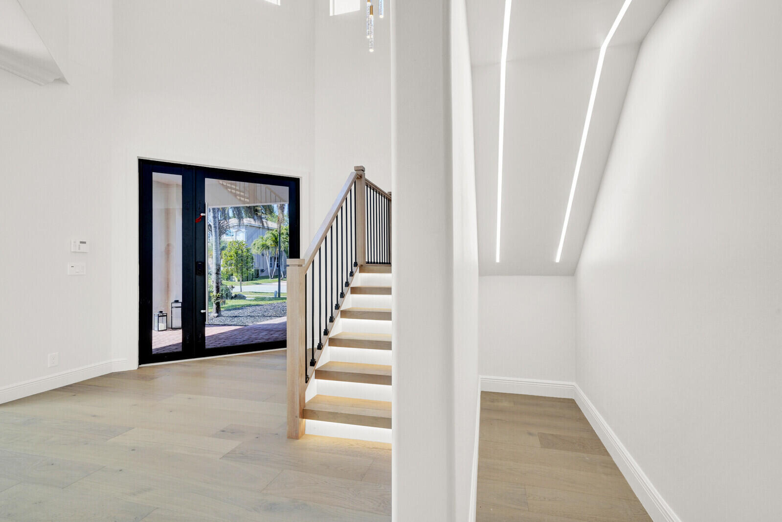 8685 Cobblestone Point Circle Boynton Beach, FL 33472 - Photo 32 of 70 a view of entryway and hall with wooden floor