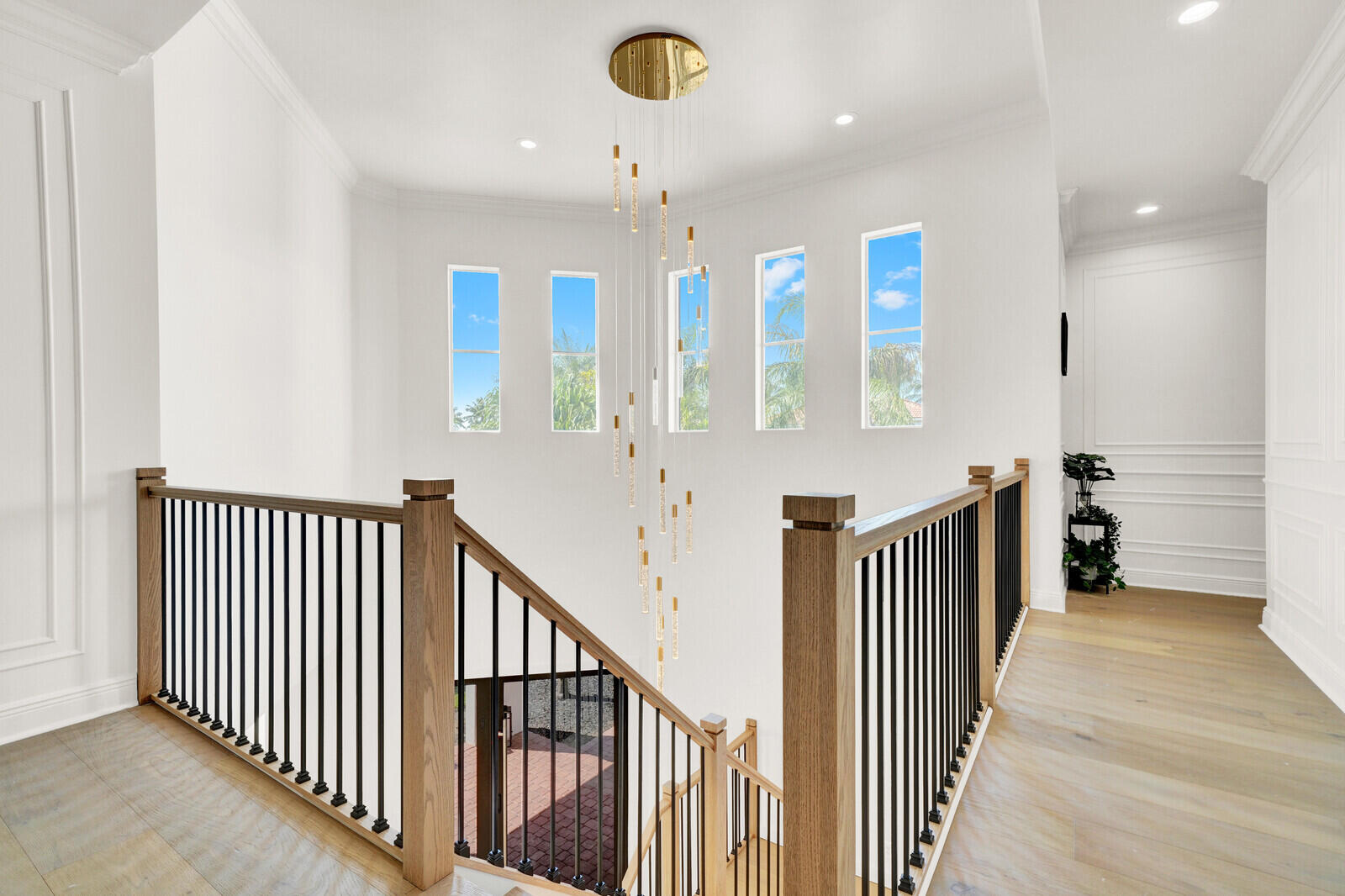 8685 Cobblestone Point Circle Boynton Beach, FL 33472 - Photo 34 of 70 a view of a hallway with windows and stairs