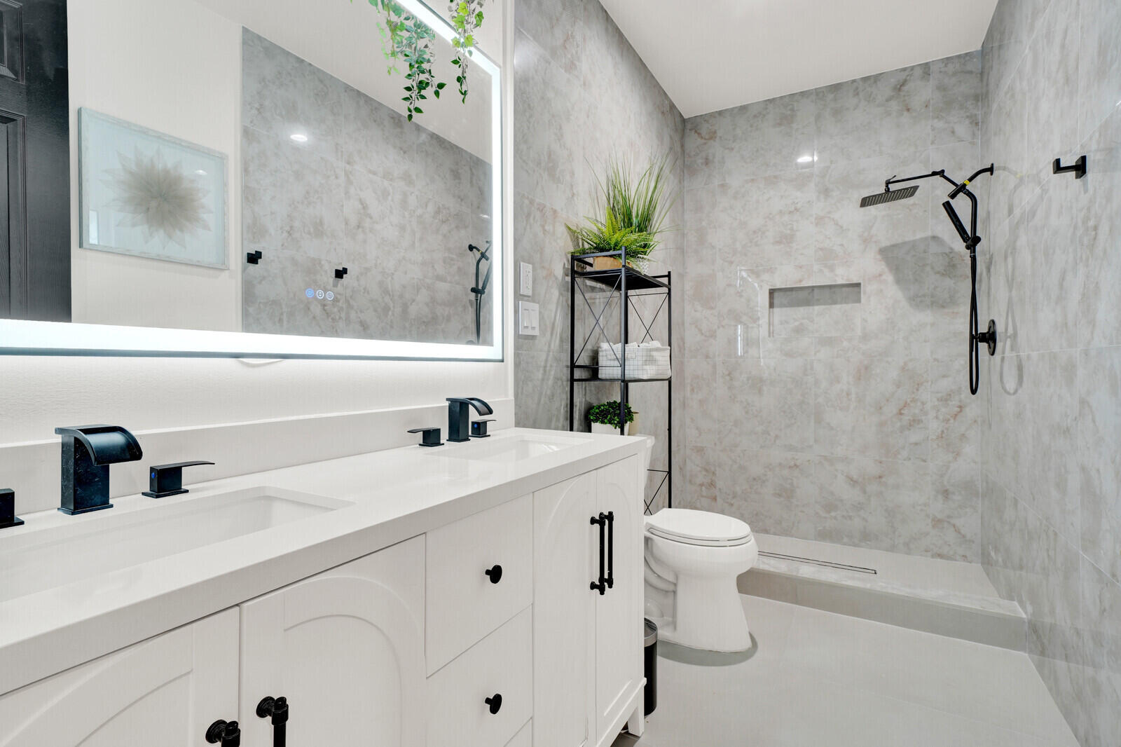 8685 Cobblestone Point Circle Boynton Beach, FL 33472 - Photo 39 of 70 a bathroom with a sink a toilet and shower