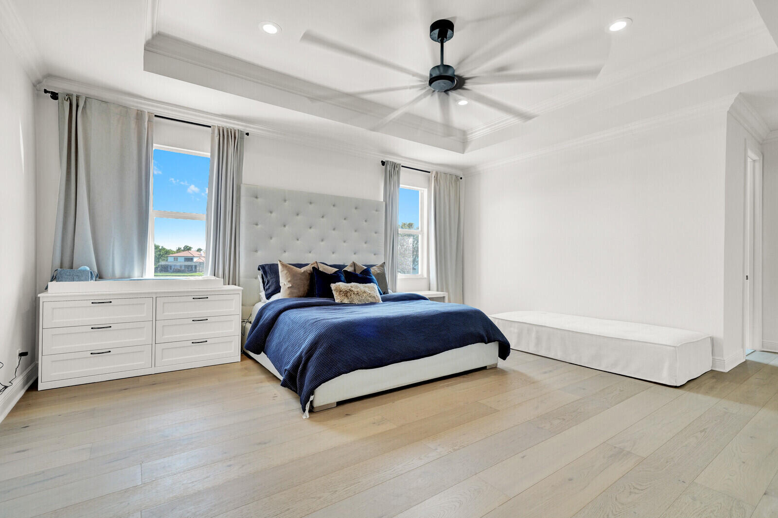 8685 Cobblestone Point Circle Boynton Beach, FL 33472 - Photo 44 of 70 a spacious bedroom with a bed and a window