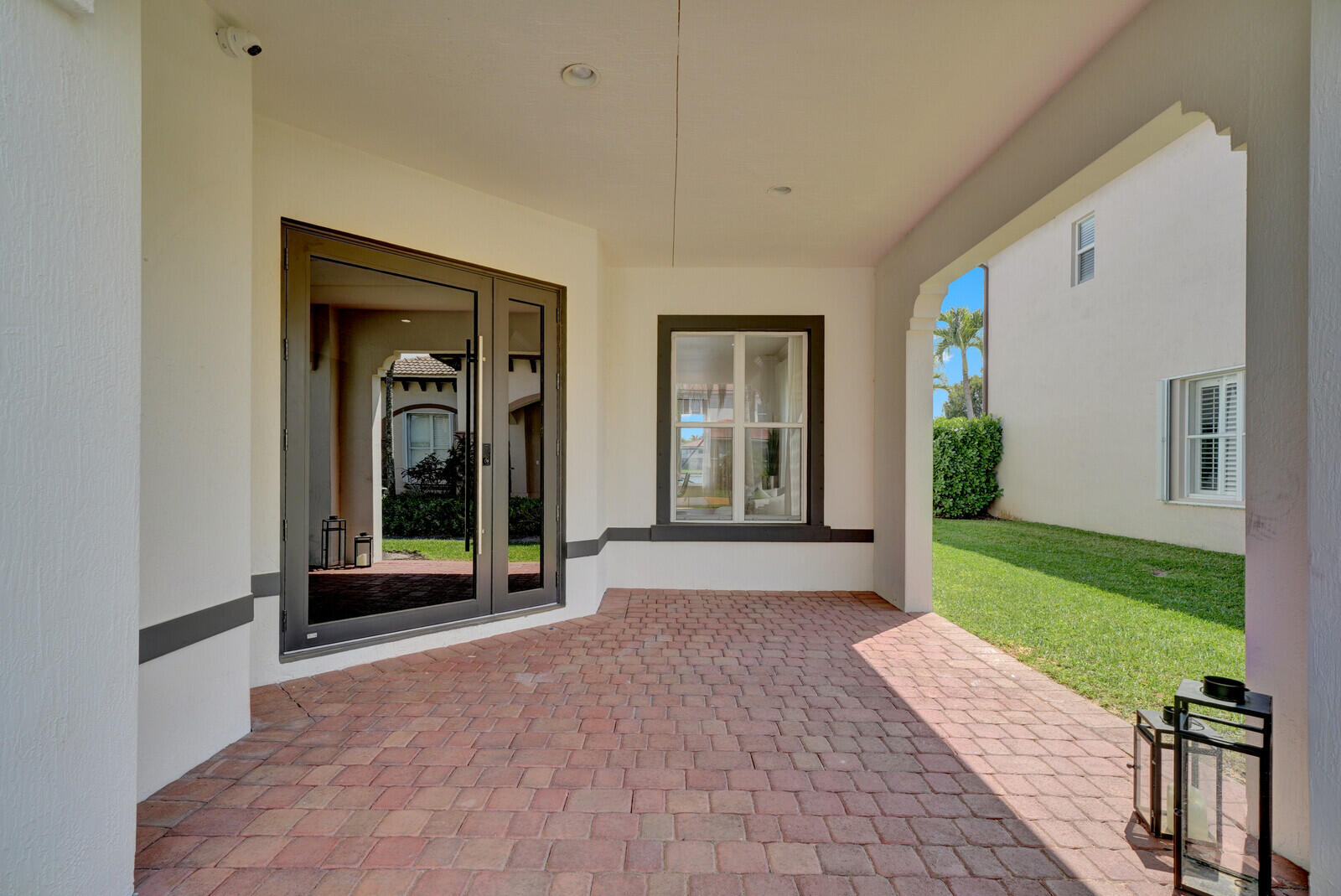 8685 Cobblestone Point Circle Boynton Beach, FL 33472 - Photo 5 of 70 a view of a house with a porch
