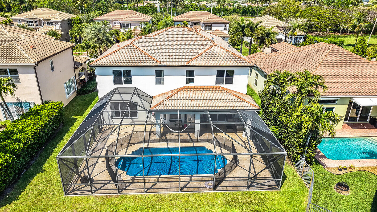 8685 Cobblestone Point Circle Boynton Beach, FL 33472 - Photo 61 of 70 a front view of a house with swimming pool