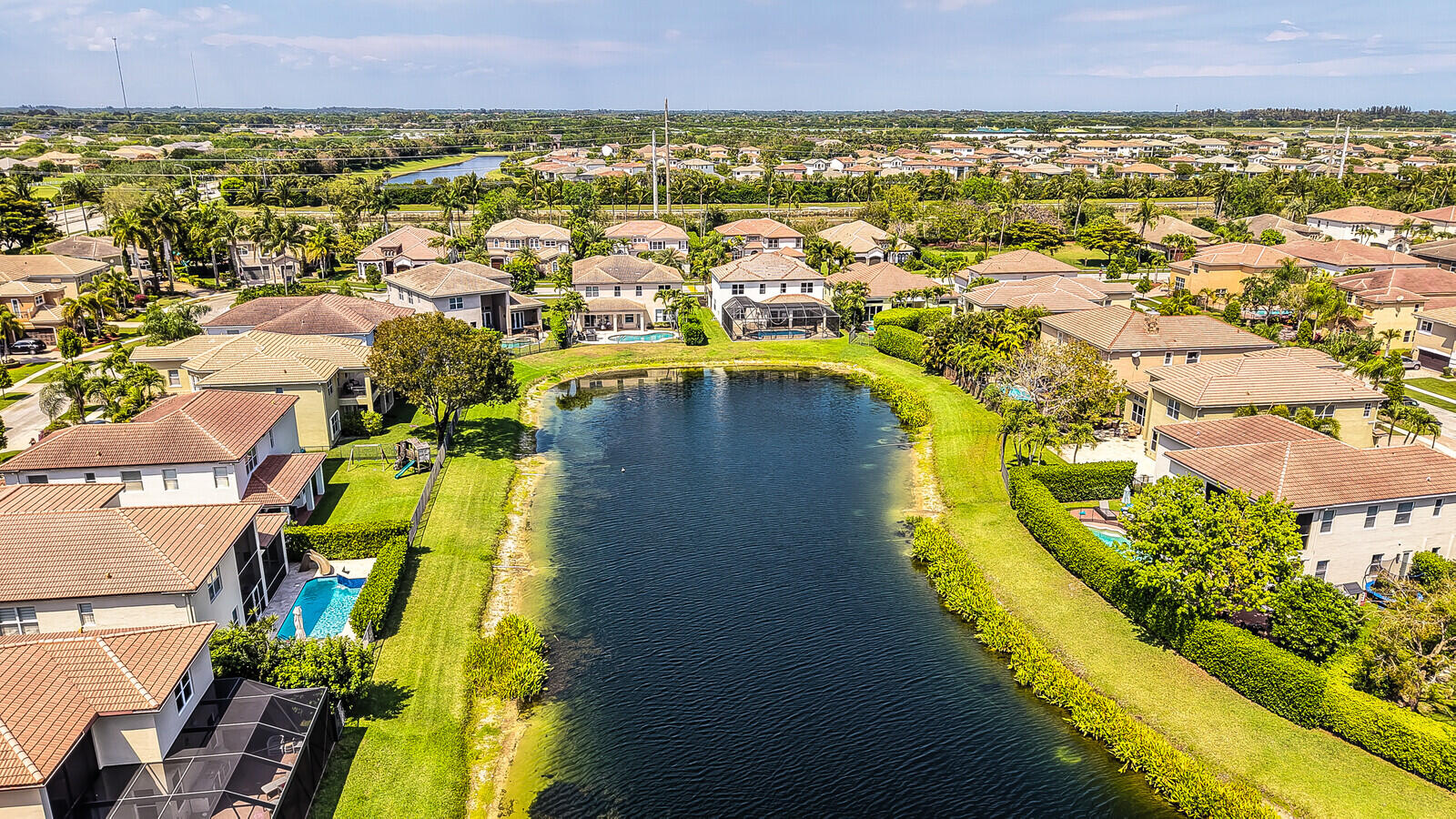 8685 Cobblestone Point Circle Boynton Beach, FL 33472 - Photo 63 of 70 an aerial view of residential houses with outdoor space and swimming pool