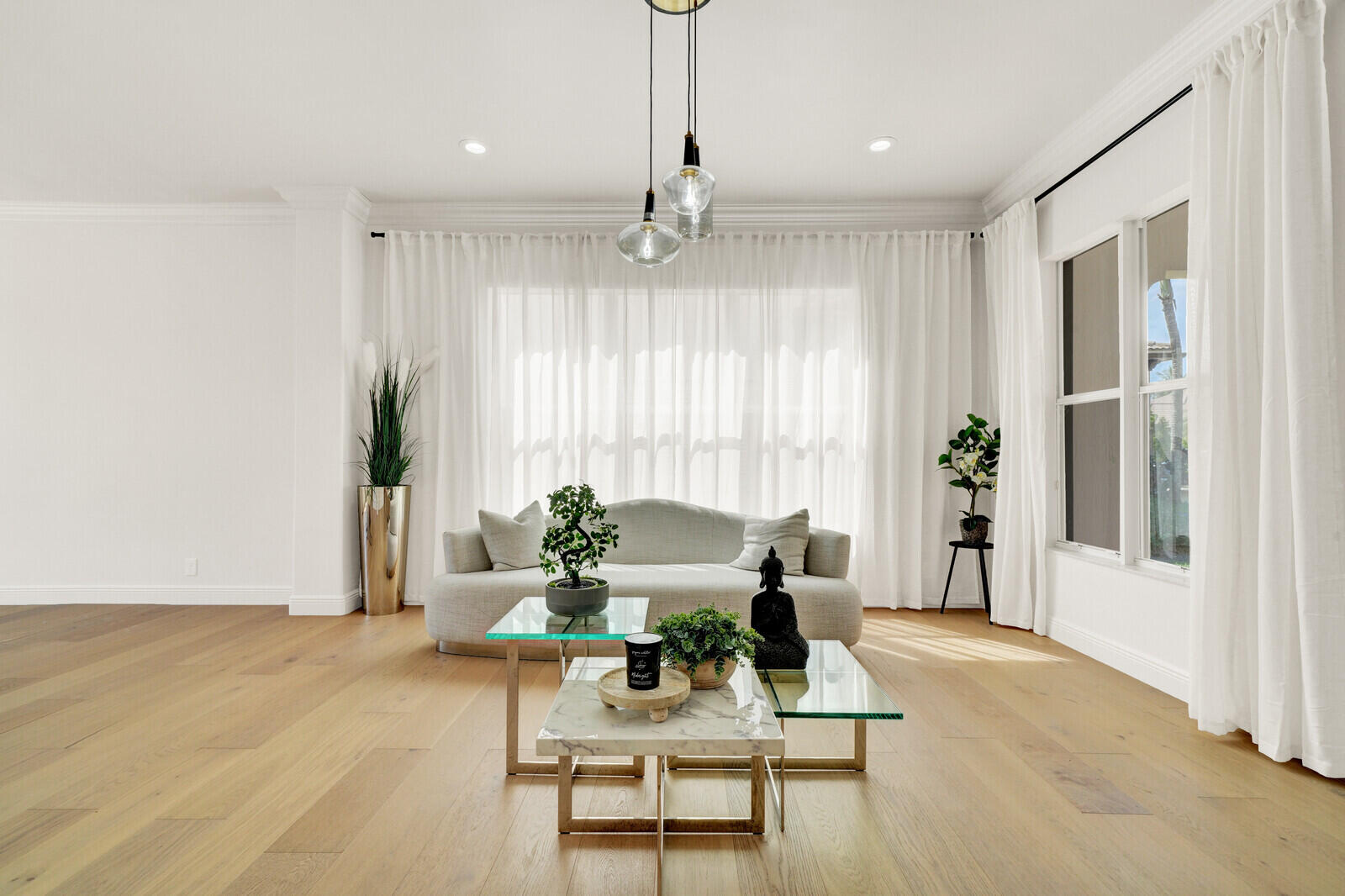8685 Cobblestone Point Circle Boynton Beach, FL 33472 - Photo 9 of 70 a living room with furniture and a large window