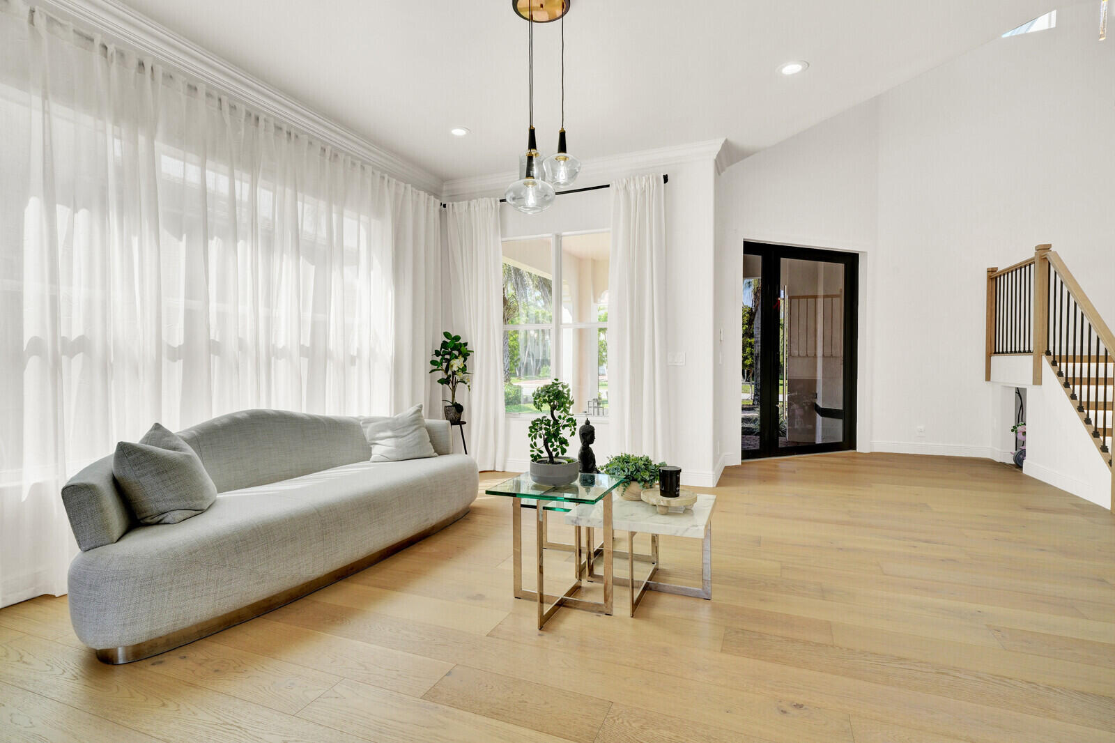 8685 Cobblestone Point Circle Boynton Beach, FL 33472 - Photo 10 of 70 a living room with furniture and a large window