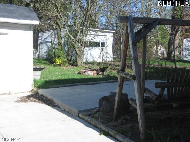 1520 Maplegrove Road South Euclid, OH 44121 - Photo 17 of 17 Backyard patio and firepit