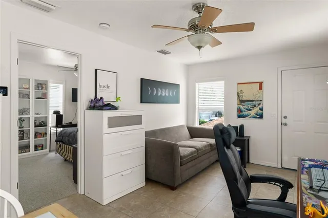 a kitchen with stainless steel appliances granite countertop a refrigerator a sink and a refrigerator