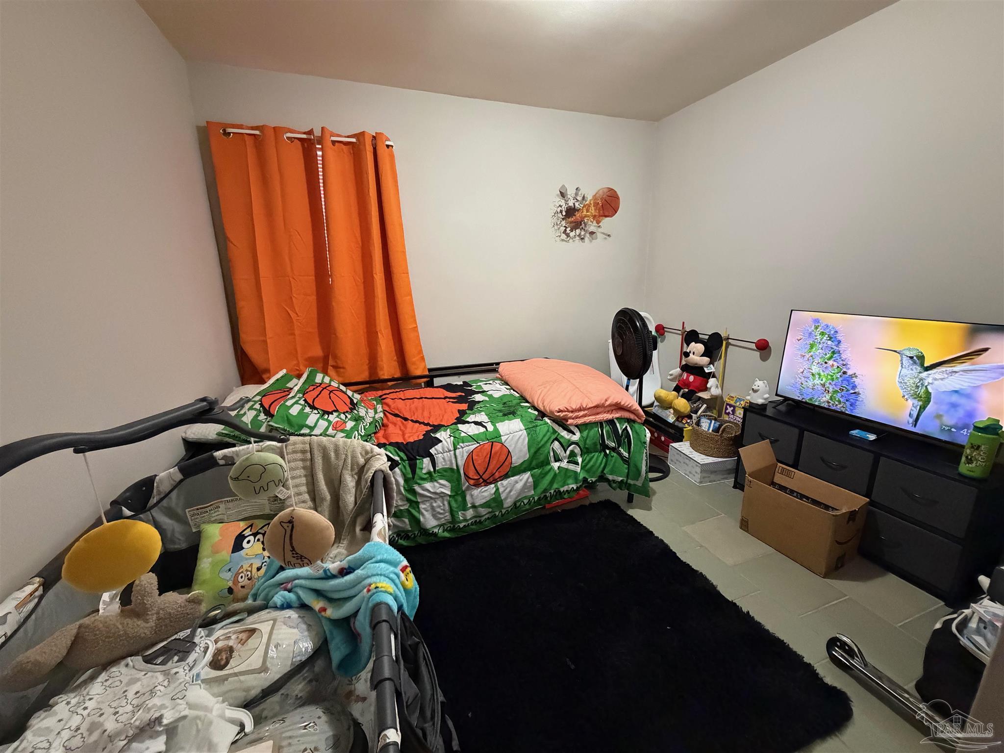 130 East 9 Mile Road Pensacola, FL 32534 - Photo 12 of 25 a bedroom with furniture and a window