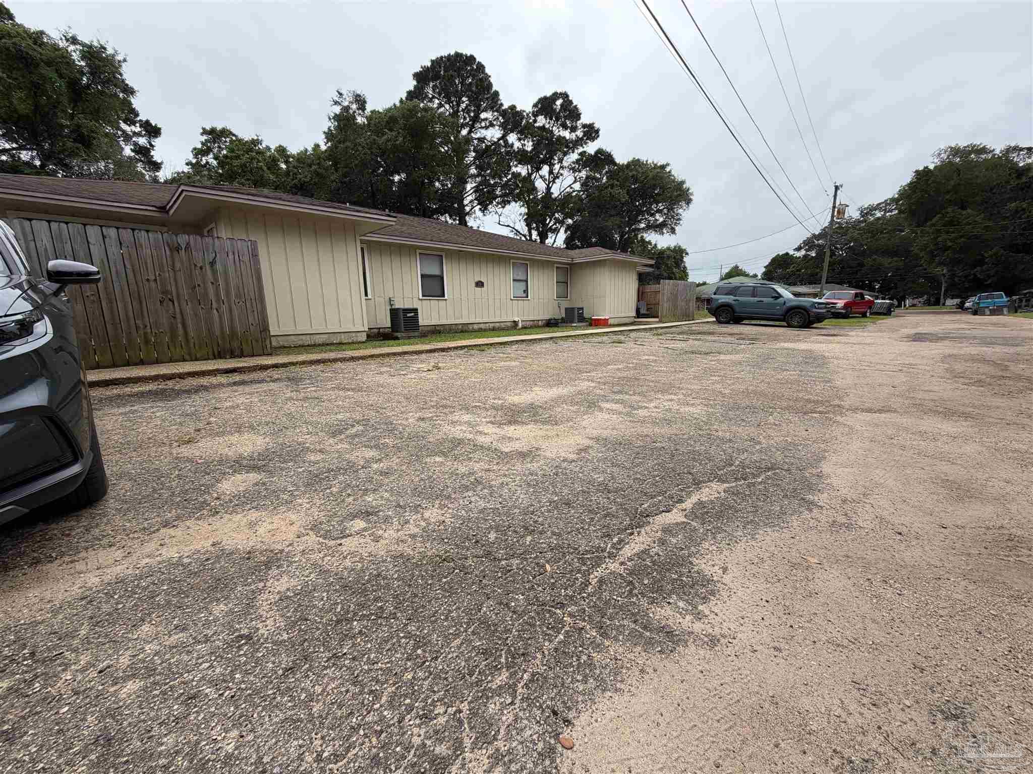 130 East 9 Mile Road Pensacola, FL 32534 - Photo 23 of 25 a view of garage and yard