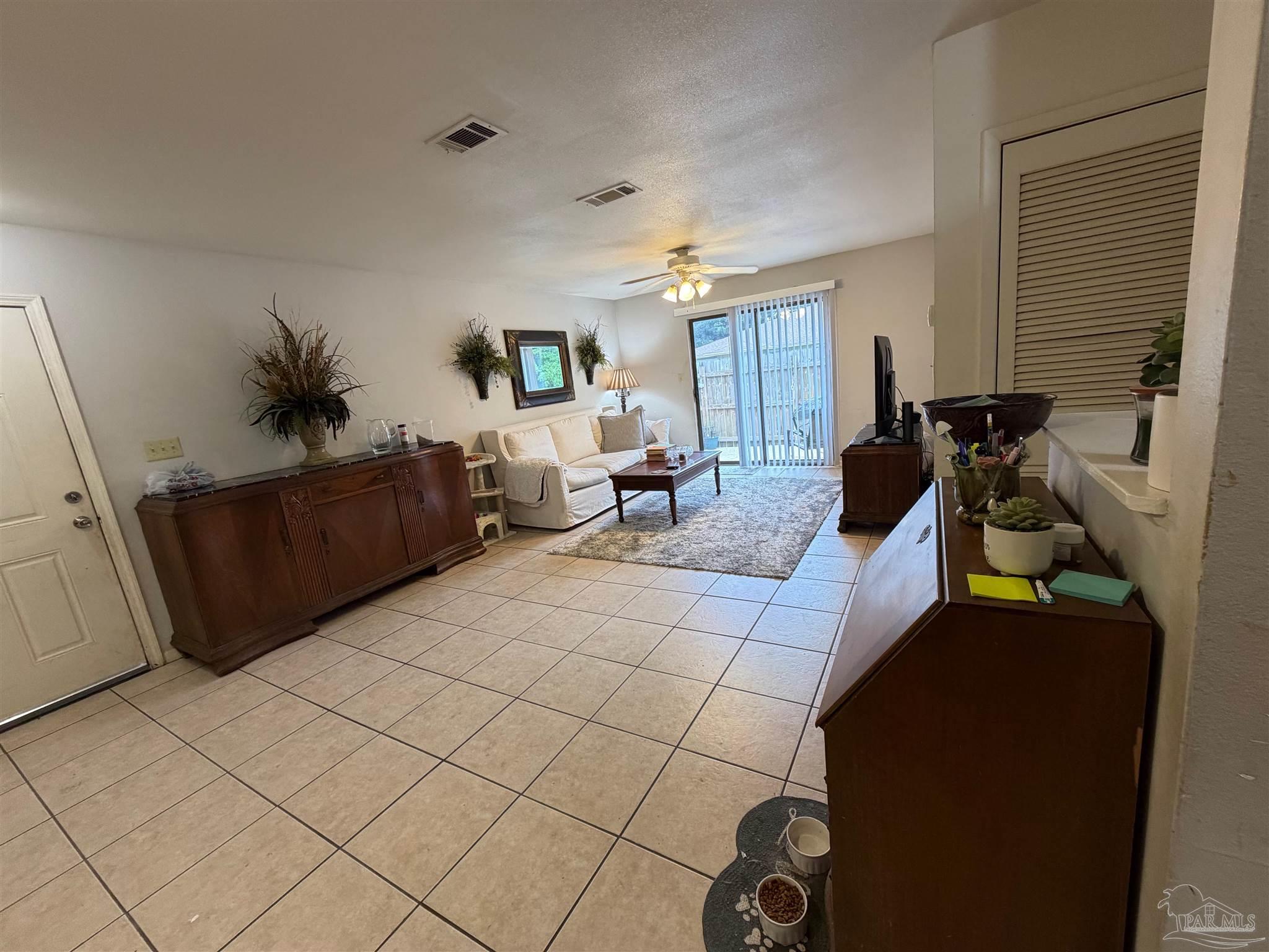 130 East 9 Mile Road Pensacola, FL 32534 - Photo 7 of 25 a living room with furniture