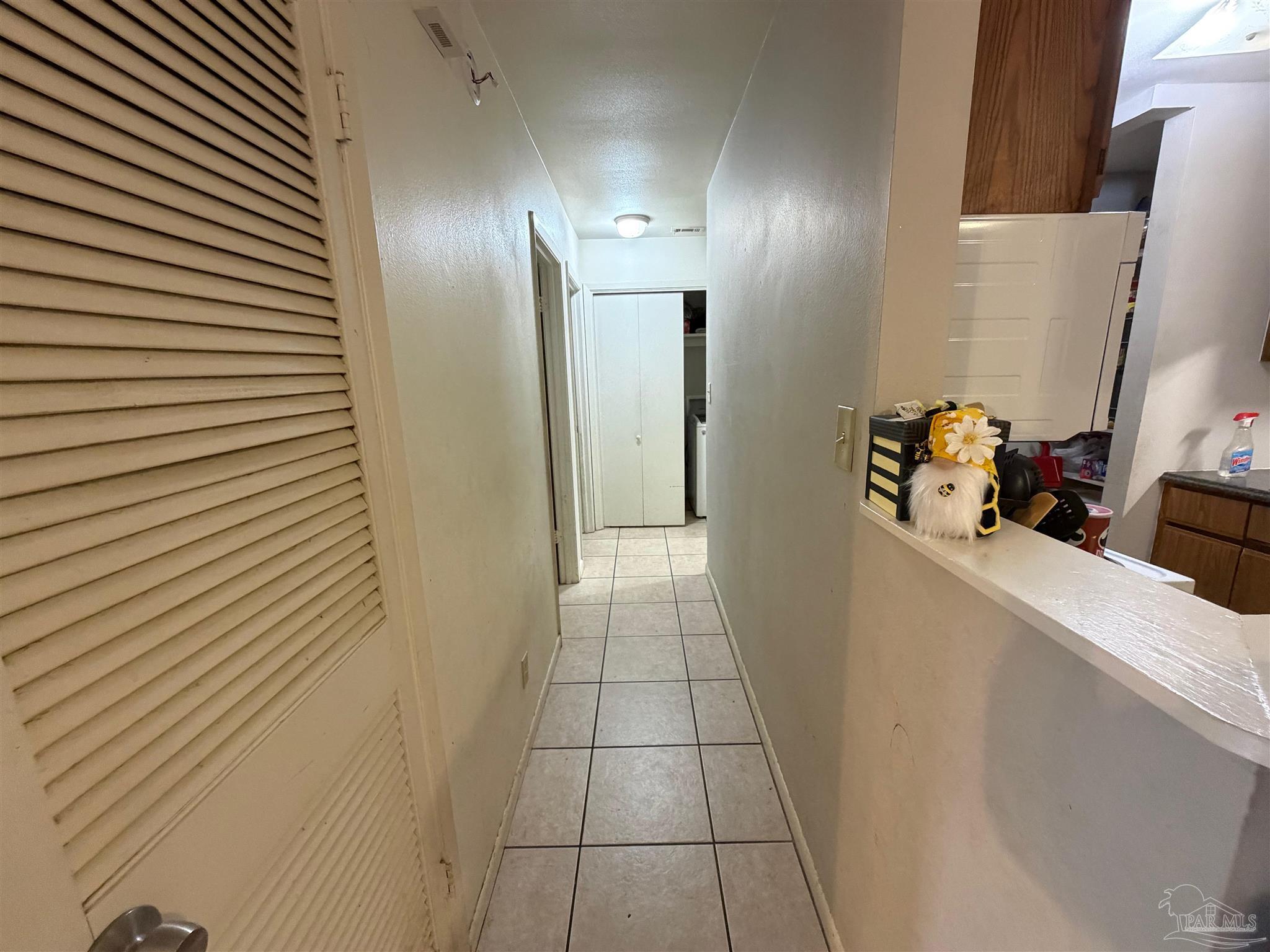 130 East 9 Mile Road Pensacola, FL 32534 - Photo 8 of 25 a view of a hallway to rooms