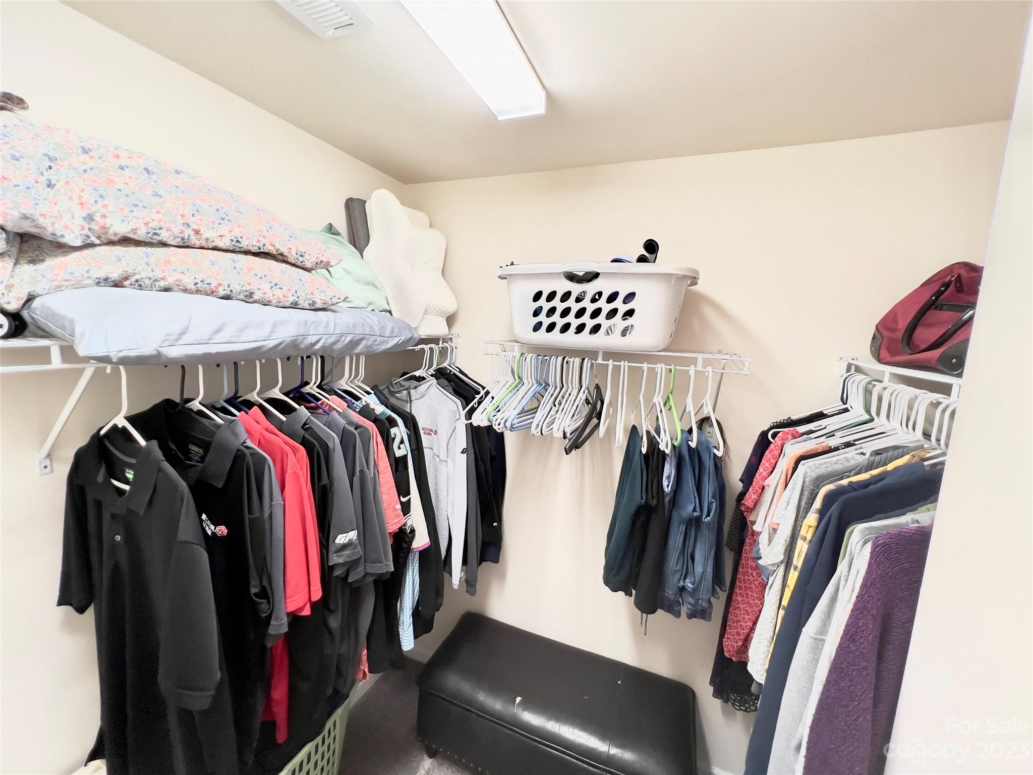 833 Canoe Song Road Fort Mill, SC 29708 - Photo 10 of 12 a view of walk in closet with clothes and shoes