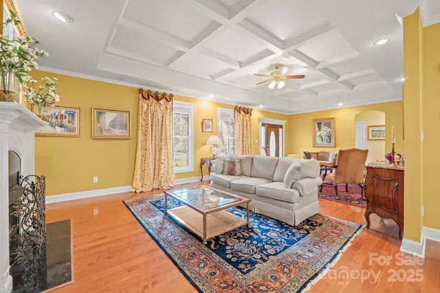 a living room with furniture and a rug