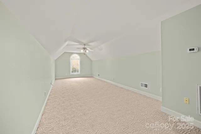 an empty room with a bathroom