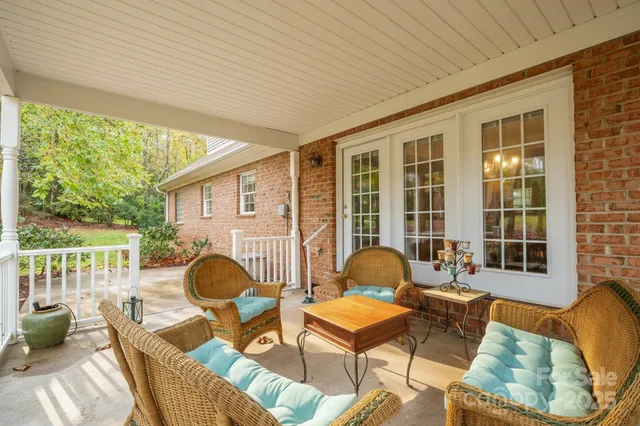 a outdoor living space with furniture and garden view