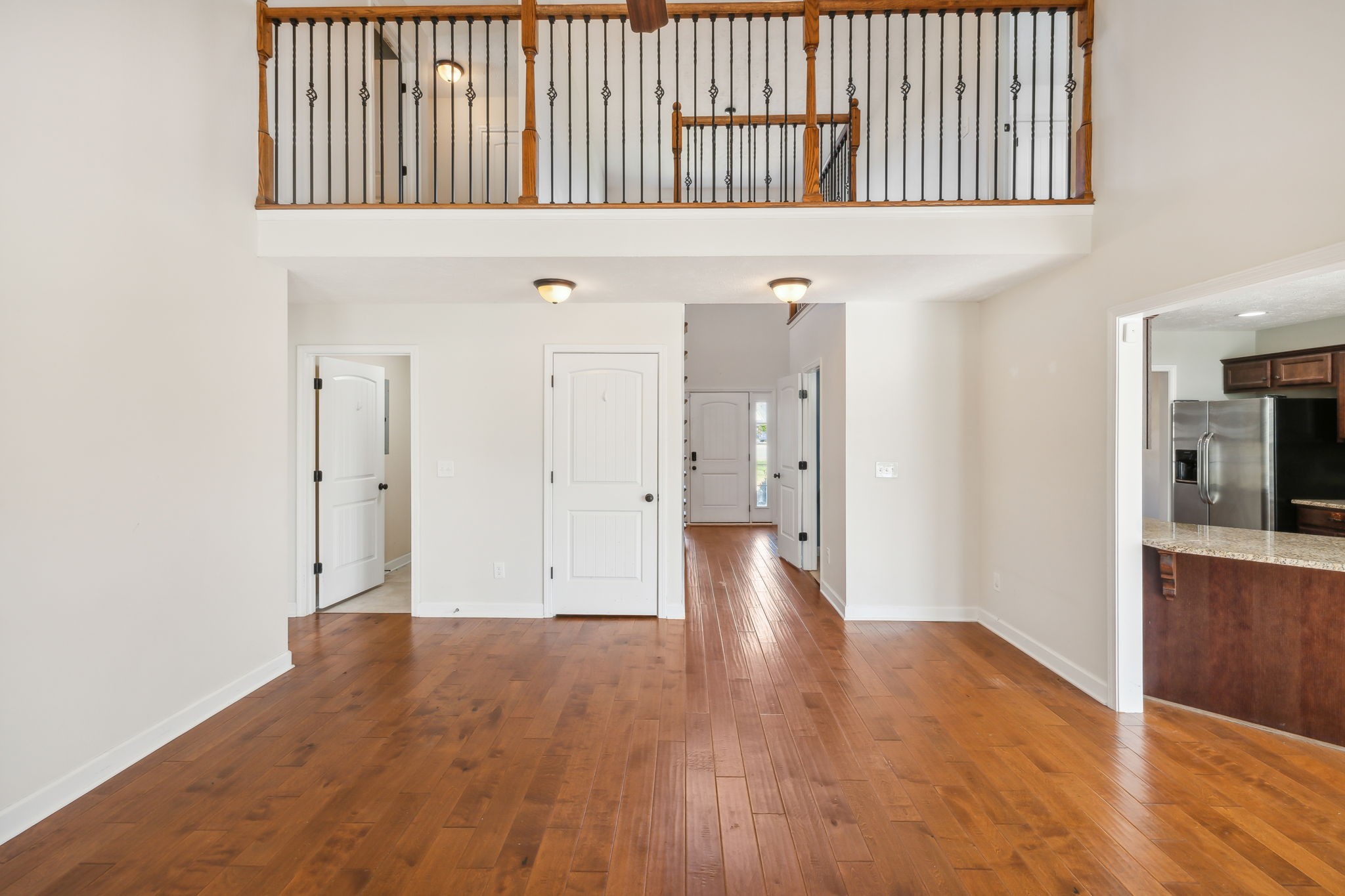 100 Riddick Court Murfreesboro, TN 37127 - Photo 16 of 56 a view of an empty room with wooden floor and a window