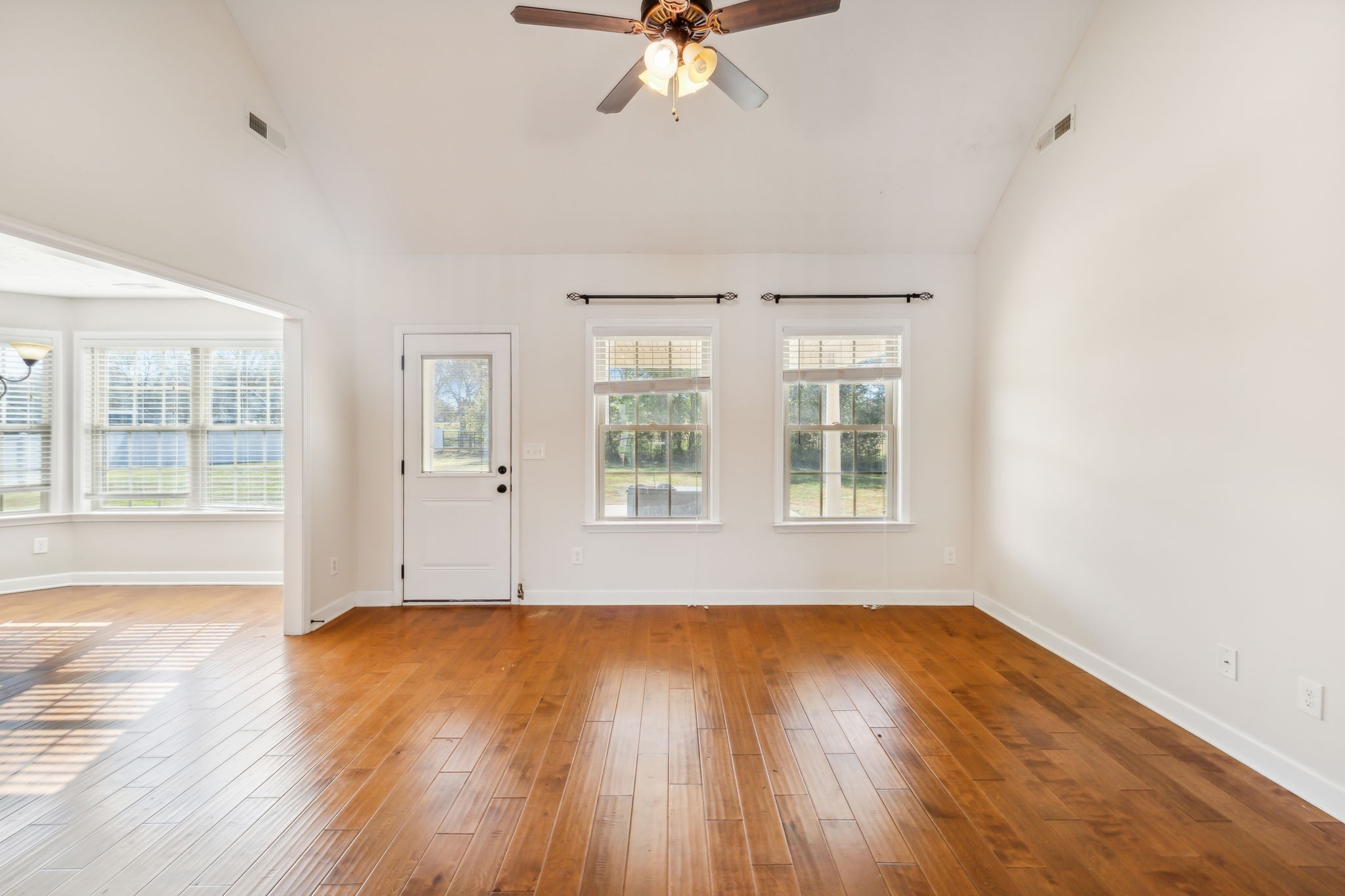 100 Riddick Court Murfreesboro, TN 37127 - Photo 17 of 56 a view of an empty room with wooden floor and a window
