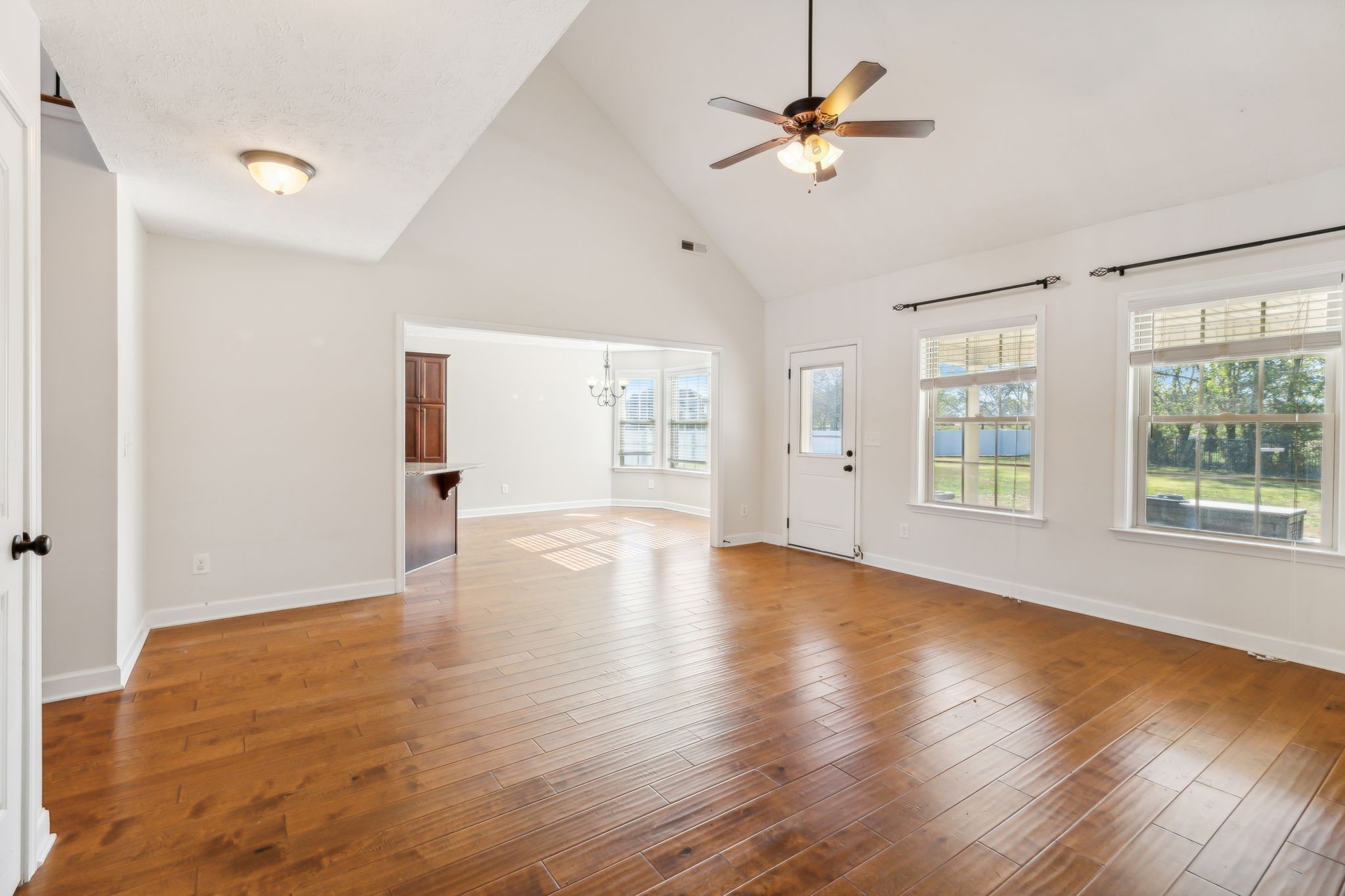 100 Riddick Court Murfreesboro, TN 37127 - Photo 18 of 56 a view of an empty room with window and wooden floor