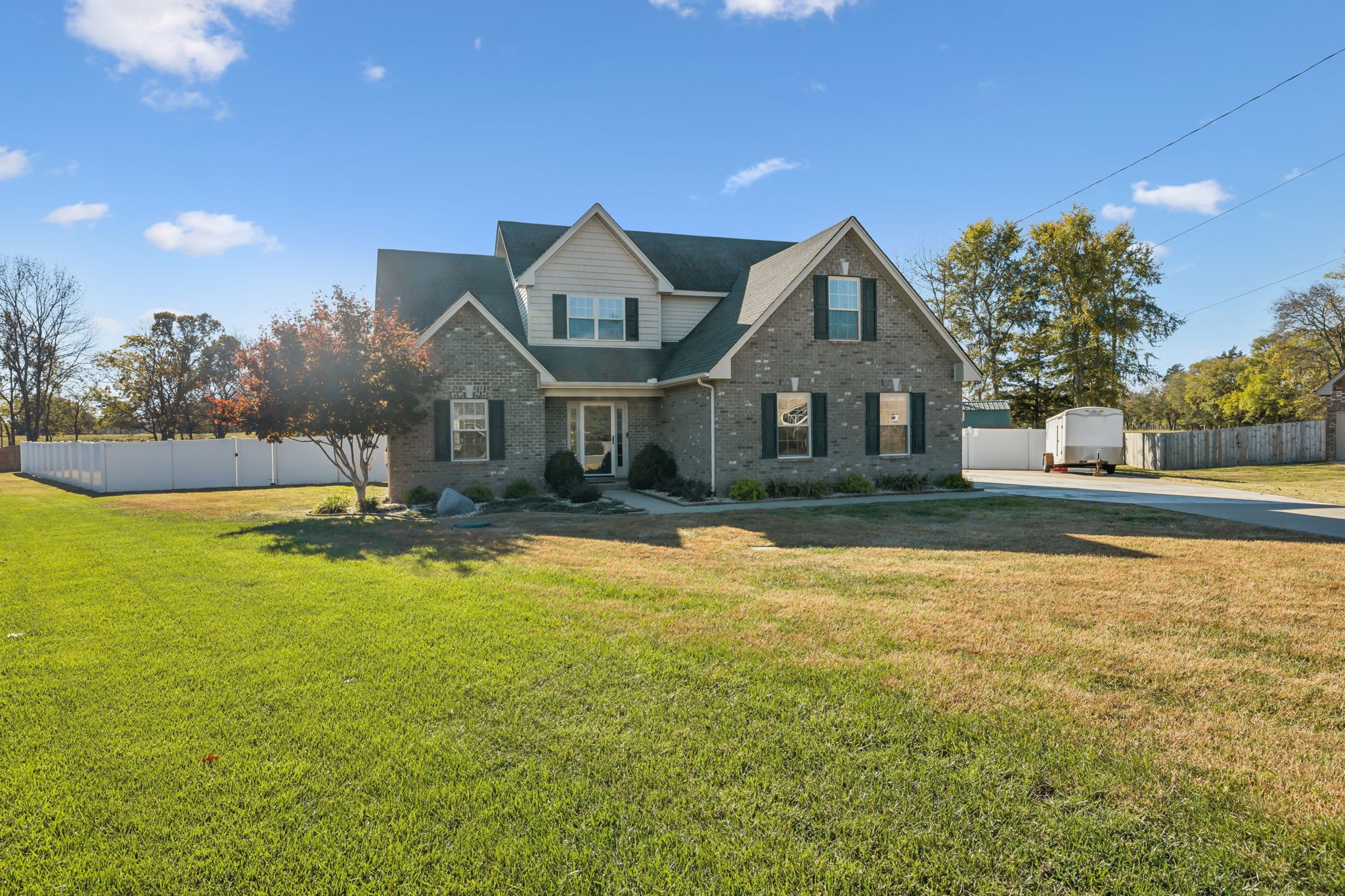 100 Riddick Court Murfreesboro, TN 37127 - Photo 2 of 56 a front view of a house with a yard