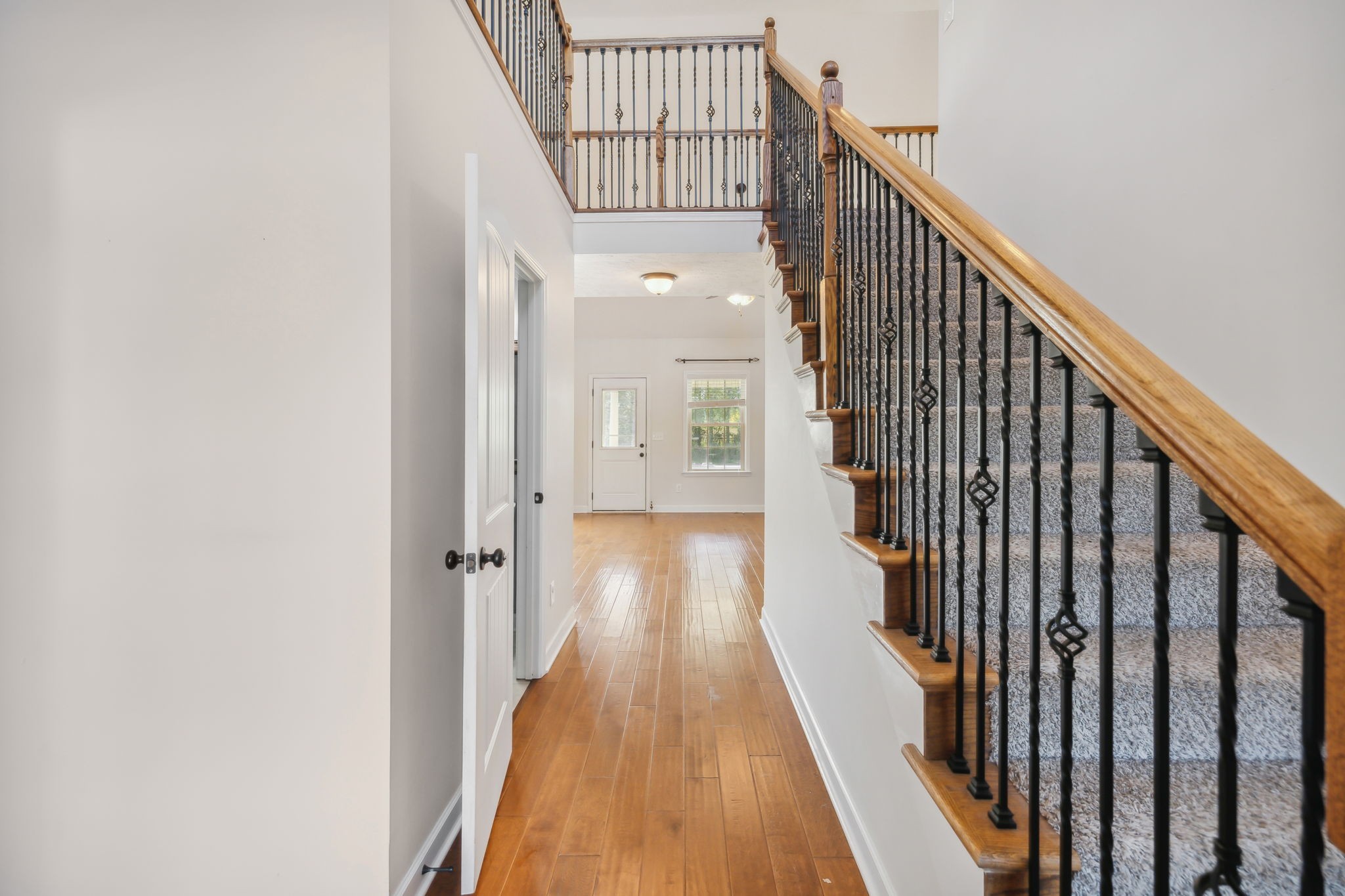 100 Riddick Court Murfreesboro, TN 37127 - Photo 4 of 56 a view of a hallway with wooden floor and staircase