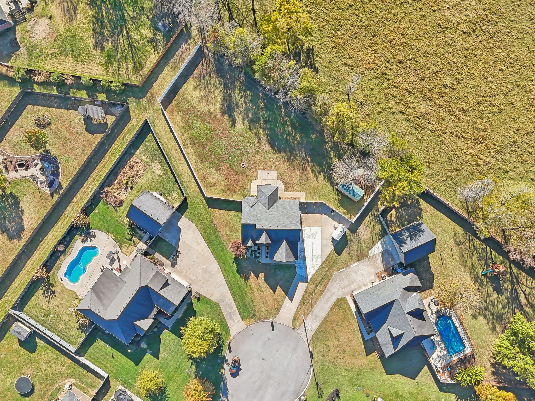 100 Riddick Court Murfreesboro, TN 37127 - Photo 46 of 56 an aerial view of a house with a trees