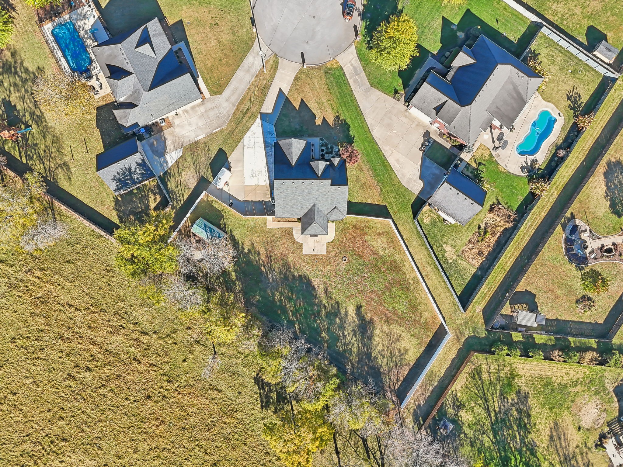 100 Riddick Court Murfreesboro, TN 37127 - Photo 53 of 56 an aerial view of a house with swimming pool