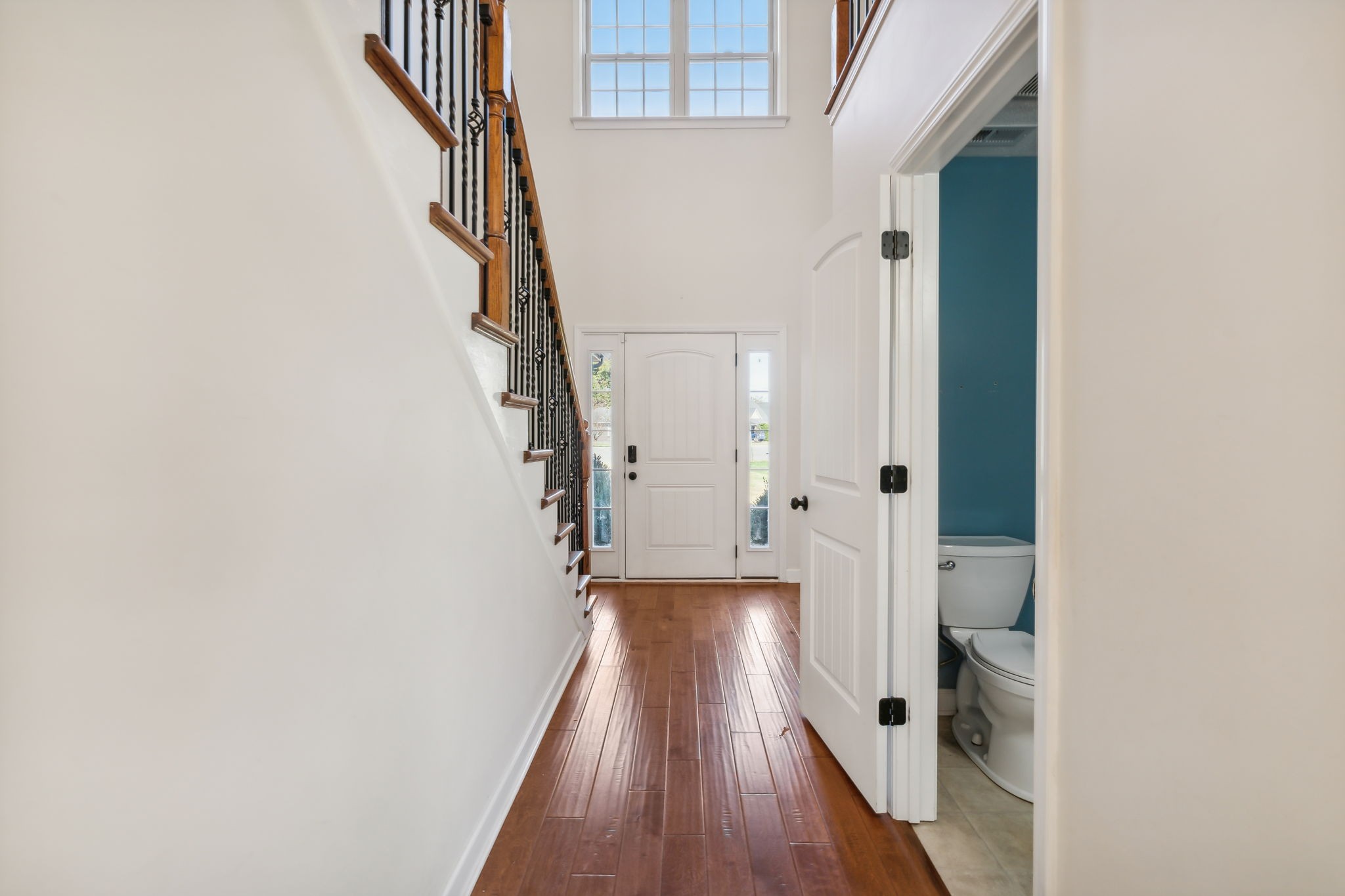 100 Riddick Court Murfreesboro, TN 37127 - Photo 6 of 56 a view of a hallway with wooden floor and staircase