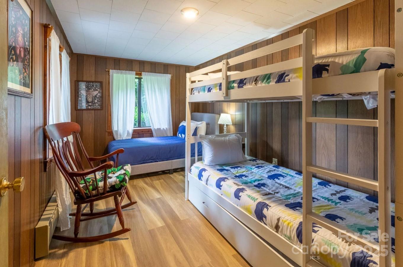 1491 Battle Branch Road Bryson City, NC 28713 - Photo 17 of 34 a bedroom with furniture and a window