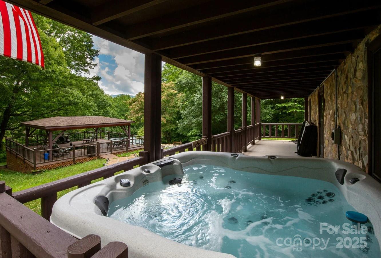 1491 Battle Branch Road Bryson City, NC 28713 - Photo 20 of 34 a view of a swimming pool with a patio