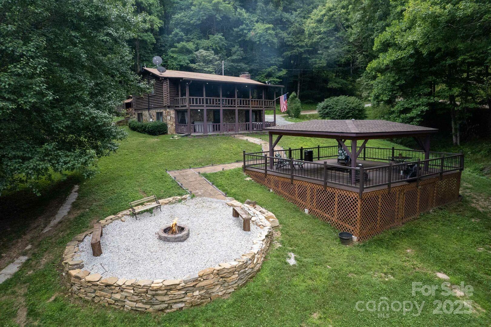1491 Battle Branch Road Bryson City, NC 28713 - Photo 21 of 34 an aerial view of a house with swimming pool garden and patio