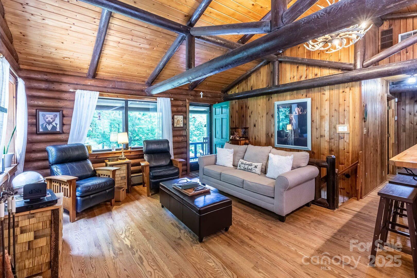 1491 Battle Branch Road Bryson City, NC 28713 - Photo 4 of 34 a living room with furniture and a large window